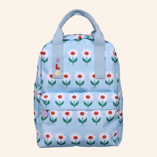 OLE kinderrugzak met madeliefjesprint op een lichtblauwe achtergrond